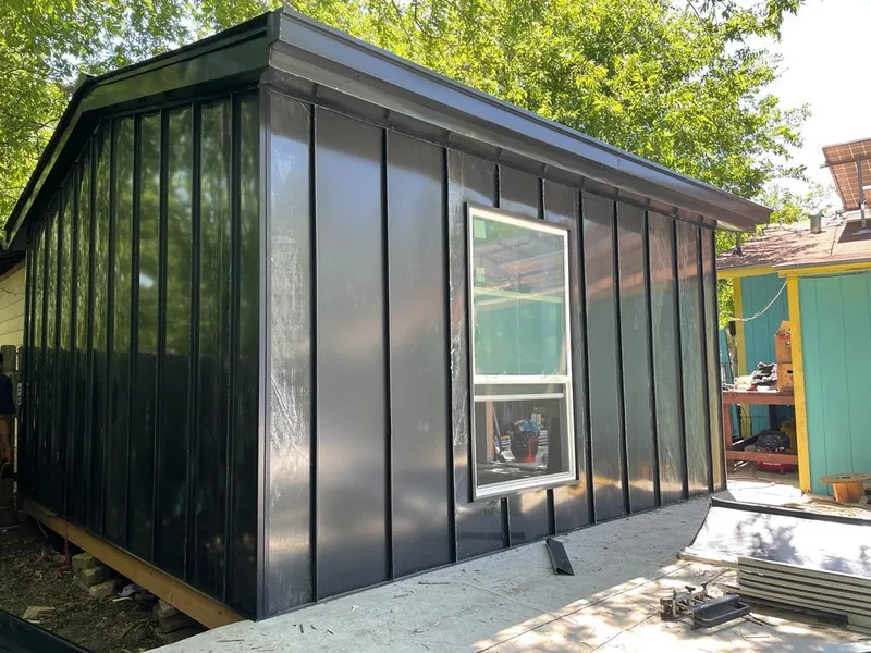 Black standing seam metal wall panels for Roof Inspection in Center